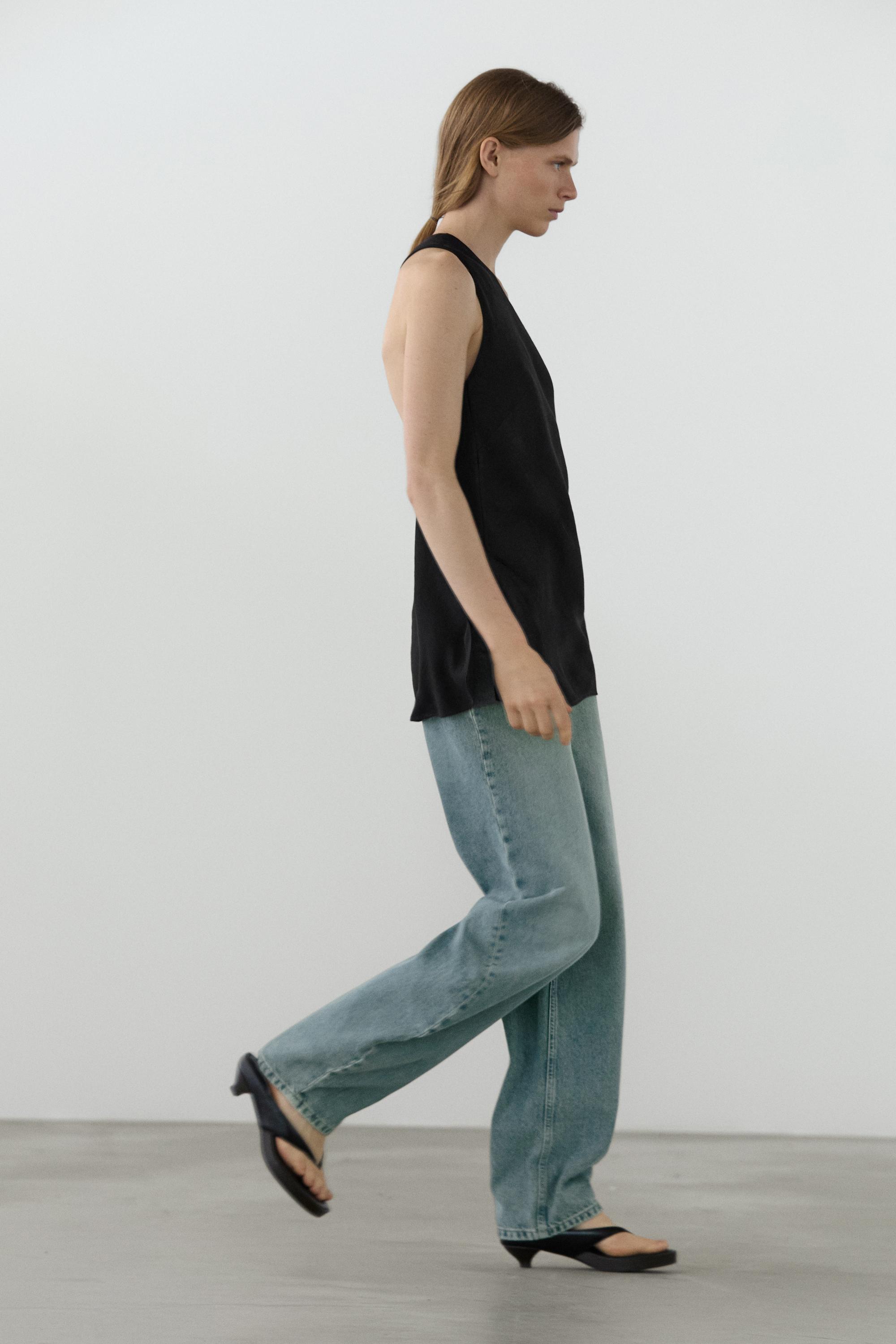 Asymmetric linen blend top with back detail
